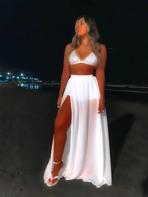 conjunto top de paetês e saia longa transparente