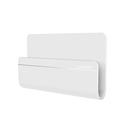 UGREEN Soporte de Pared Adhesivo para Teléfono / Diseño de Montaje en Pared / Protección De Silicona Antideslizante / Anti Arañazos / Adhesivo 3M / Soporta Dispositivos 165*81*26.5 mm. / Caja De ABS / Color Blanco MOD: 30394