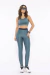 modelo vista de frente com Top Academia Di Paula Rejane Verde Azulado e calça legging di paula verde azulado
