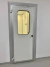 INSTALACION PUERTAS DE PANELERIA SANITARIA - Cuben SA