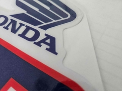 Gráfica de tanque Premium para Honda XR250R y XR250L, con diseño en colores azul y rojo, mostrando el logo de Honda.