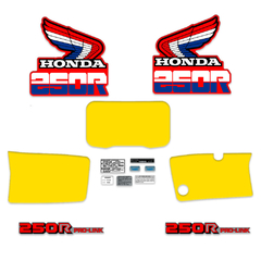 Kit completo de gráficas para Honda XR250R 1985, incluye calcos de advertencia en color amarillo y diseño vintage.