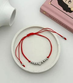 Pulsera hilo chino con corazón acero quirurgico - comprar online