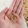 Argollas trenzadas acero dorado
