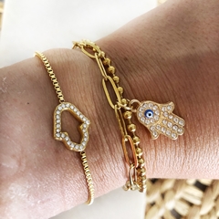 Pulsera doble con dije acero dorado en internet