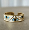 Anillo occhi acero dorado