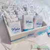 60 chocolates personalizados para 15 años con cinta, dijes y caja