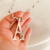 Collar-con-inicial-botanica-Dolores-Ortega-A-Jewelry-Designer