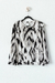 Sweater MAGALI, Sweater de lanilla estampada con volados en hombros - SYES | Mayorista