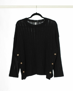 Sweater URANO de manga caída con cartera y botones a los laterales en internet