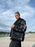 Campera puffer negra brillosa