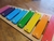 Xilofón de madera multicolor
