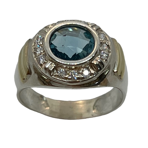 Anillo de Plata 925 y Oro18klts. Aguamarina y Circoñas.