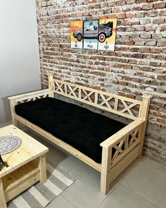 Diván cama con almohadones