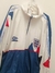Campera Rompeviento Inglaterra 80s Talle XL (73 x 76 cm) - Camisetas con historia