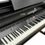 Piano Digital Harmonia HS 88 Roma Preto Fosco com teclado e painel de controle visíveis.