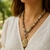 Collar de rodonita tostada y coral blanco - comprar online