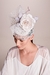 Graciella Starling, Alta chapelaria. Fascinator com base branca e voielette e Flor de seda off-white, perfeita para casamentos. Inspirado pela Princesa Kate Mildleton. Pode ser usado para eventos diurnos ou noturnos. Perfeito para noivas no campo ou na pr