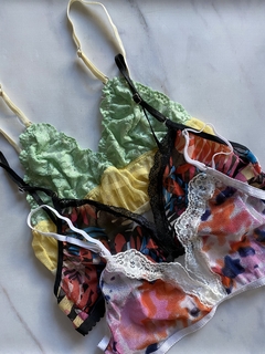3 tops surtidos $40.000 x Transf