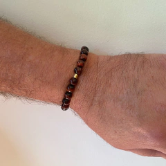 pulseira de pedra olho de boi com entremeio liso banhado a ouro 18k