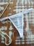 Calcinha Fio Tule Transparente com Pingente na internet