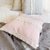 ALMOHADON BOHO ROSADO