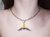 Collar con snitch