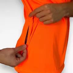 REMERA DEPORTIVA PANTRO C/BOLSILLO NARANJA UNISEX en internet