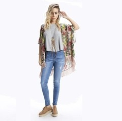 Pantalón jean mujer elastizado, marca RIMMEL, roturas, corte chupin, bolsillos delanteros y traseros, azul