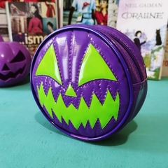 Nécessaire Pumpkin Roxa e Verde na internet
