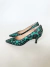 Stiletto kitten leopard en internet