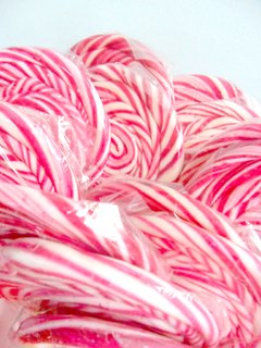 PALETAS DE CARAMELO 6,5CM DIAM APROX ROSA Y BLANCO X10 UNID. sin gluten