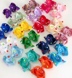 Laço com pompom (10cm) na internet