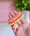 Pulseira de florzinha colorida