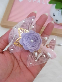 Faixa de tule com flor lilás (8cm) na internet