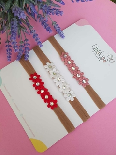 Faixa de florzinha com stras