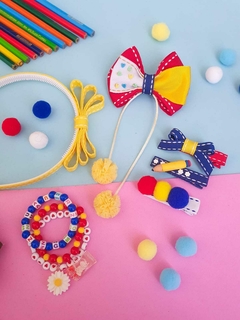 Kit escolar amarelo vermelho e azul - comprar online