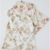 Blusa interloc rosetones - tienda online
