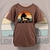 Camiseta infantil Marrom O leão e o Cordeiro