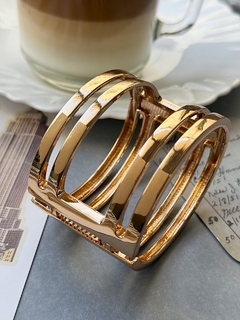 Pulsera rigida dorada DIANE en internet