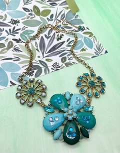 Collar dorado de flores celestes LIZ