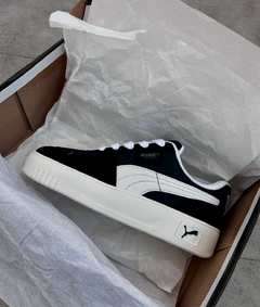 Tênis Feminino Puma Preto Branco na internet