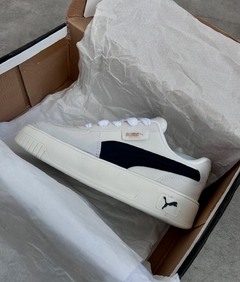Tênis Feminino Puma Branco Preto na internet
