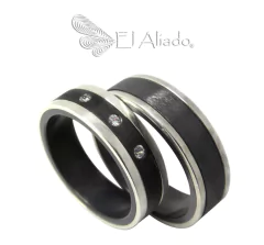 1205. Argollas de matrimonio en titanio y biseles en plata.
