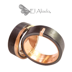1364. Argollas negras en titanio con oro rosa 18k.