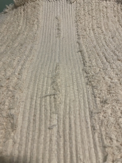 Alfombra tejida trama costado cama 60 cm