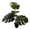 Planta artificial con base negra