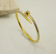 Pulsera Cartier clavo dorada