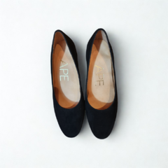 Zapatos planos negros de mujer con interior en tono marrón, marca APE.