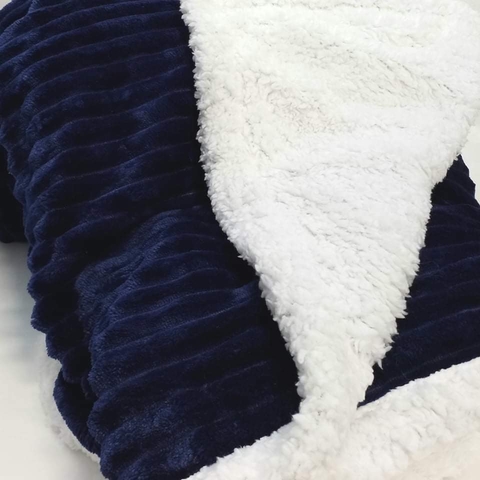 Cubrecama con corderito twin size azul Haussmann